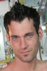 Photo of Brendan David as (archive footage)