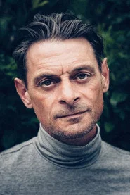 Photo of Sam Christie as Tim Grunwald