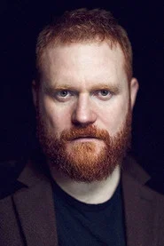 Photo of Simon Holland Roberts as La Tremouille/Page/Gentleman