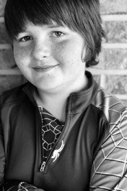 Photo of Adrian Gordy as Trent Mulkey