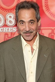 Photo of Larry Thomas as Dr. Dick Asskis
