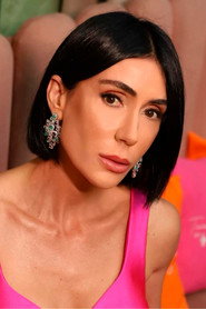 Photo of Michelle Barros as Self - Host