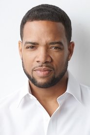 Photo of Michael Ellison as Parole Officer Percy Maddox