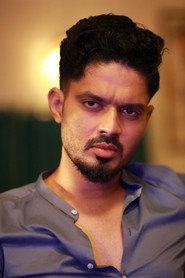 Photo of Praveen Elangho as Santhosh