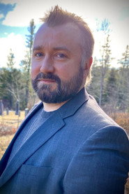 Photo of Elliott Van Dusen as Paranormal Research Specialist