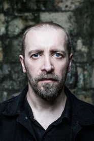 Photo of Nick Holmes as Self - Lead Vocals