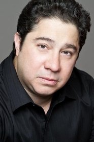 Photo of Greg Romero Wilson as Slick