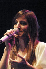Photo of Natalia Pastorutti as Azafata del micro y helicóptero