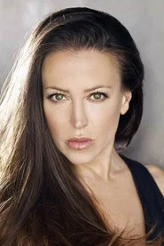 Photo of Leslie Bega as Lucia the Liquor Store Clerk