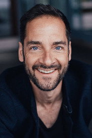 Photo of Oliver Bürgin as Polizeifotograf