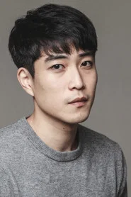 Photo of Hwanju Choi as Sang-baek