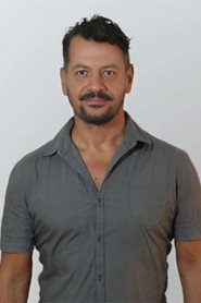 Photo of Georgios Panteleakis as Tommy ,Wolfman Radio persona,Stalker (Split personality)
