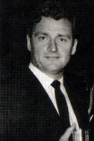 Photo of Ted Thomas as Commissioner
