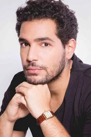 Photo of Karim El-Kerem as Thomas