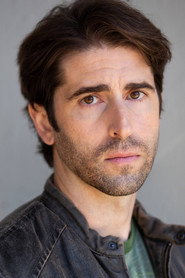 Photo of Aaron Kuban as Adrian