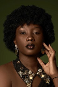 Photo of Brigitte Tchanégué as Aïcha