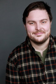Photo of Steven C. Fisher as Middle Seat Passenger