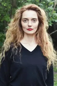 Photo of Olivia Csiky Trnka as The blonde haired Girl