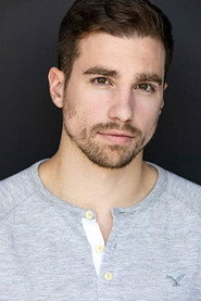 Photo of Travis Conover as Dr. Ross Webster