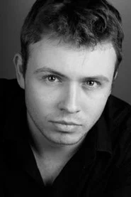 Photo of Tom Hudson as Adam