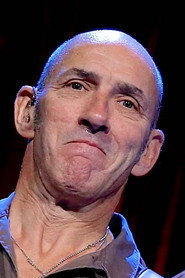 Photo of Simon Townshend as Himself - rhythm guitar, acoustic guitar, vocals