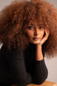 Photo of Claudia Macedo as Evellyn Preta - Convergente