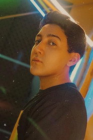 Photo of Aaron Ashab as Aji
