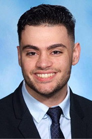 Photo of Michael Famiglietti as Self (archive footage)