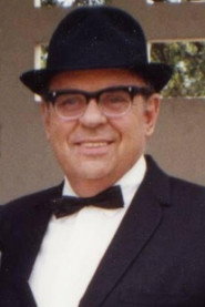 Photo of Ray LePere as Coach Bexler