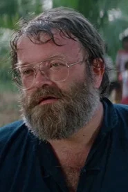 Photo of Chris Hilton as Dr. Wisut / Robber in black (partial) (voices)