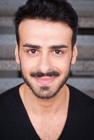Photo of Robert Hannouch as Ayman