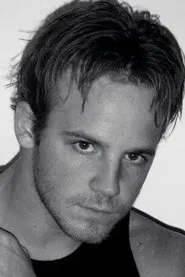 Photo of Adam C. Edwards as The Intruder