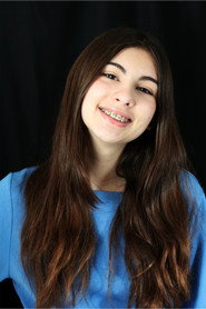 Photo of Laura Araujo as Little Miss Sinster