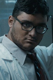 Photo of Aharon Martinez as Dr. John Basil