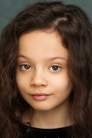 Photo of Lucia Aliu as Caroline Brackett