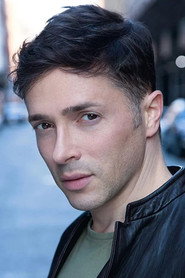 Photo of Yuval David as Al (segment "Hitchcocked")