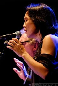 Photo of Himiko Paganotti as Self - Vocals, Percussion