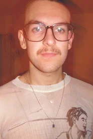 Photo of Nate Ross as Dom Langston