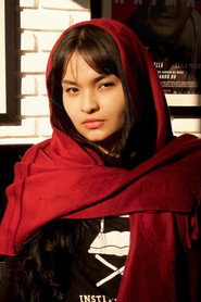 Photo of Flávia Dantas as Masked faithful