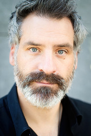 Photo of Nikolaus Schmid as Gas Station Attendant