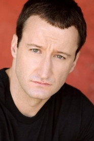 Photo of Dan Mengini as Clifford Scruggs