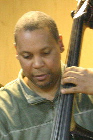 Photo of Santi Debriano as Self (Double Bass Player)