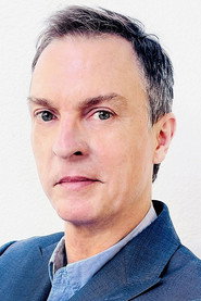 Photo of Michael Burke as Self (archive footage)