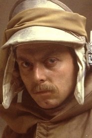 Photo of Ray Hassett as Priest