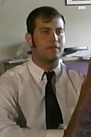 Photo of Russ Mayo as Coffee House Victim / Orgy Drummer