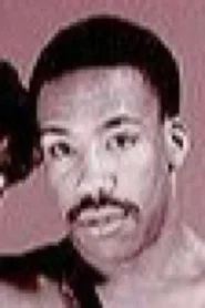 Photo of Eric Ross as (archive footage)