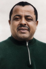 Photo of Mohamed Boumezrag as Self (archive footage)
