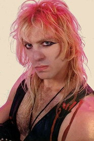 Photo of Tony Richards as W.A.S.P. Drummer (segment "Heavy Metal")