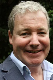 Photo of Rob Curling as News Presenter
