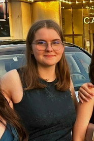 Photo of Suzanne Cochin as NSI Girl